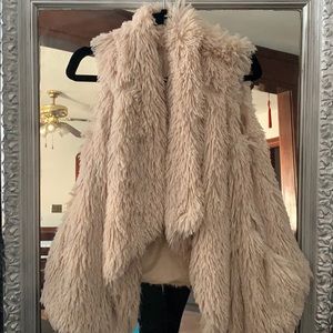 Fluffy cream vest